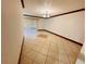 Dining room with tile floors and a chandelier at 4407 S Semoran Blvd # 2, Orlando, FL 32822