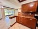Kitchen with granite countertops and a breakfast bar at 4407 S Semoran Blvd # 2, Orlando, FL 32822