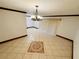 Bright dining room with tile floors and chandelier at 4407 S Semoran Blvd # 2, Orlando, FL 32822