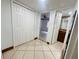 Clean hallway with tile floors and access to bedroom and bathroom at 4407 S Semoran Blvd # 2, Orlando, FL 32822