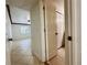 Hallway with tile floor and access to bedroom and bathroom at 4407 S Semoran Blvd # 2, Orlando, FL 32822