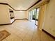 Bright dining room with tile floors and access to a screened patio at 4407 S Semoran Blvd # 2, Orlando, FL 32822