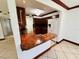 Kitchen features granite countertops, wood cabinets, and modern appliances at 4407 S Semoran Blvd # 2, Orlando, FL 32822