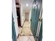 Condo hallway with tiled floor and kitchen peek at 4407 S Semoran Blvd # 2, Orlando, FL 32822