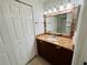 Bathroom with granite countertop and double sink vanity at 4407 S Semoran Blvd # 2, Orlando, FL 32822