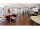 Large community room with multiple tables and chairs at 4407 S Semoran Blvd # 2, Orlando, FL 32822