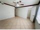 Spacious bedroom with tile floors and a large closet at 4407 S Semoran Blvd # 2, Orlando, FL 32822