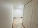 Bright hallway with tile floors and ample storage at 4407 S Semoran Blvd # 2, Orlando, FL 32822