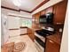 Modern kitchen featuring stainless steel appliances and granite countertops at 4407 S Semoran Blvd # 2, Orlando, FL 32822