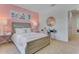 Bright bedroom with pink accents and built-in desk at 820 Debary Ave, Deltona, FL 32725