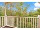 Private balcony overlooking a wooded area at 8447 Crystal Cove Loop, Kissimmee, FL 34747