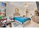 Bedroom with a teal bedspread and wood-toned furniture at 8447 Crystal Cove Loop, Kissimmee, FL 34747