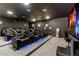 State-of-the-art home theater with multiple reclining seats at 18357 Mowry Ct, Orlando, FL 32827
