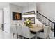Elegant dining room featuring a large table and statement lighting at 18357 Mowry Ct, Orlando, FL 32827