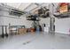 Garage with overhead storage and extra space at 18357 Mowry Ct, Orlando, FL 32827