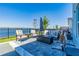 Relaxing patio with fire pit and lake view at 18357 Mowry Ct, Orlando, FL 32827