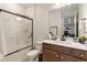 Modern bathroom with a soaking tub and walk-in shower at 18357 Mowry Ct, Orlando, FL 32827