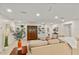 Spacious living room with sectional sofa and built-in shelving at 2570 Turnbull Bay Rd, New Smyrna Beach, FL 32168