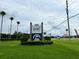 Sign for Legacy Grand Condos and nearby businesses at 5245 W Irlo Bronson Memorial Hwy # 154, Kissimmee, FL 34746