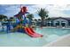 Community pool with water slide and play area at 2412 Dubai St, Kissimmee, FL 34747