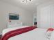 Cozy bedroom with a queen-size bed and a media center at 2412 Dubai St, Kissimmee, FL 34747