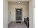 Inviting front door entrance with a welcoming mat and bench at 2412 Dubai St, Kissimmee, FL 34747