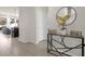 Bright entryway with tile floors, console table, and mirror at 2412 Dubai St, Kissimmee, FL 34747
