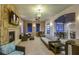 Relaxing community room with fireplace and comfortable seating at 2412 Dubai St, Kissimmee, FL 34747