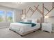 Luxurious main bedroom with king-size bed and large windows at 2412 Dubai St, Kissimmee, FL 34747