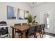 Bright dining room with wooden table and six chairs at 2412 Dubai St, Kissimmee, FL 34747