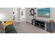 Spacious living room with comfortable seating and large TV at 2412 Dubai St, Kissimmee, FL 34747