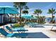 Spacious pool deck with numerous lounge chairs at 2412 Dubai St, Kissimmee, FL 34747