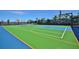 Community sports court with basketball and tennis areas at 2412 Dubai St, Kissimmee, FL 34747