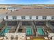 Aerial view of townhouses, each with its own screened-in pool at 2412 Dubai St, Kissimmee, FL 34747