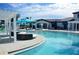 Relaxing pool area with a large pool and comfortable seating at 2412 Dubai St, Kissimmee, FL 34747