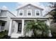 Two-story craftsman home with gray siding and front porch at 12152 Illustration Dr, Orlando, FL 32832