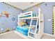 Minions themed bedroom with a bunk bed and fun wall decor at 2610 Calistoga Ave, Kissimmee, FL 34741