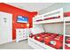 Fun bedroom with a Mickey Mouse theme and bunk beds at 2610 Calistoga Ave, Kissimmee, FL 34741