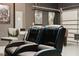Two black leather gaming chairs in the game room at 2610 Calistoga Ave, Kissimmee, FL 34741