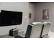 Relaxing home theater with comfortable seating and large TV at 2610 Calistoga Ave, Kissimmee, FL 34741