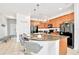 Modern kitchen with granite countertop and stainless steel appliances at 2610 Calistoga Ave, Kissimmee, FL 34741
