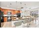 Modern kitchen with island, granite countertops, and breakfast bar at 2610 Calistoga Ave, Kissimmee, FL 34741