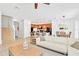 Open floor plan living room with kitchen and staircase views at 2610 Calistoga Ave, Kissimmee, FL 34741