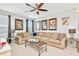 Spacious living room featuring comfortable seating and a large coffee table at 2610 Calistoga Ave, Kissimmee, FL 34741