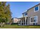 Townhouse with screened porch and grassy backyard at 2748 River Landing Dr, Sanford, FL 32771