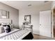 Bright bedroom with polka dot bedding and a mirrored dresser at 3475 Sandalwood Isle Way, Ocoee, FL 34761