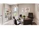 Home office with built-in desk and large window at 3475 Sandalwood Isle Way, Ocoee, FL 34761