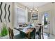 Bright dining room with wood table and access to backyard at 3894 Lana Ave, Davenport, FL 33897