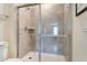 Walk-in shower with glass enclosure and modern tile at 3894 Lana Ave, Davenport, FL 33897