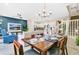 Open concept dining area with view of living room and kitchen at 3894 Lana Ave, Davenport, FL 33897